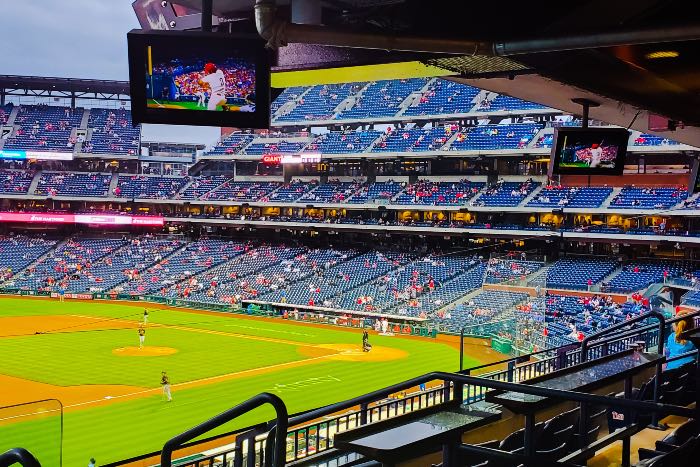 "The Improbable Success of the Phillies" - a photo of a mostly empty ballpark in Philadelphia