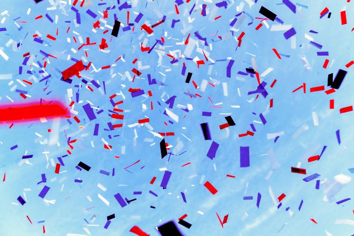 "celebrate" - a photo of confetti in the sky