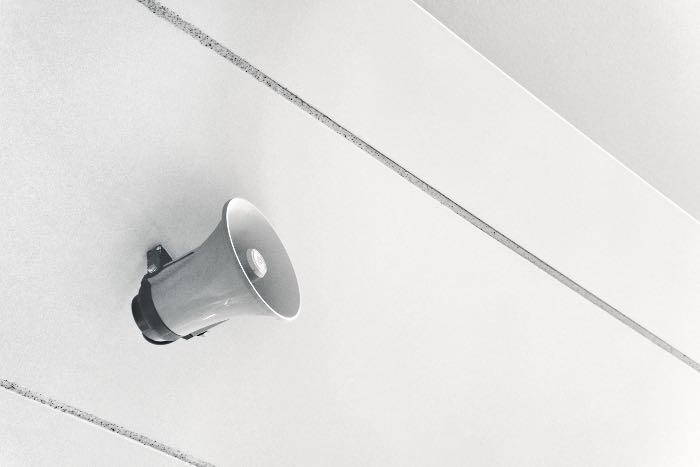 a photo of a megaphone attached to a. wall