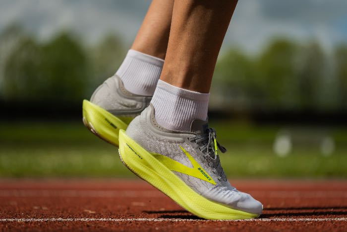a photo of a person's feet on a track
