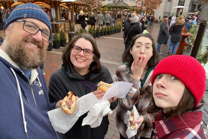 a photo of us at the Christkindlmarkt, eating food