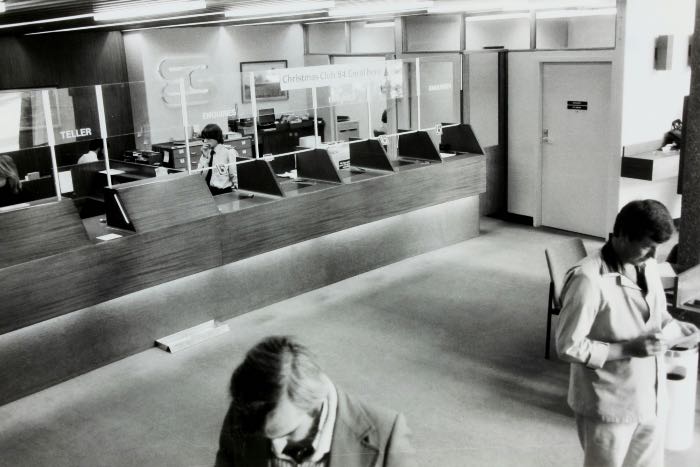 a photo of the lobby of a bank, taken in the 1980s.