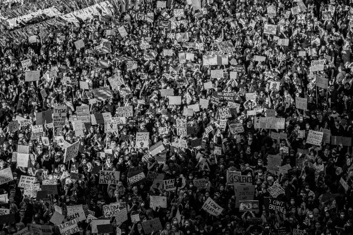 a photo of a large group of people protesting