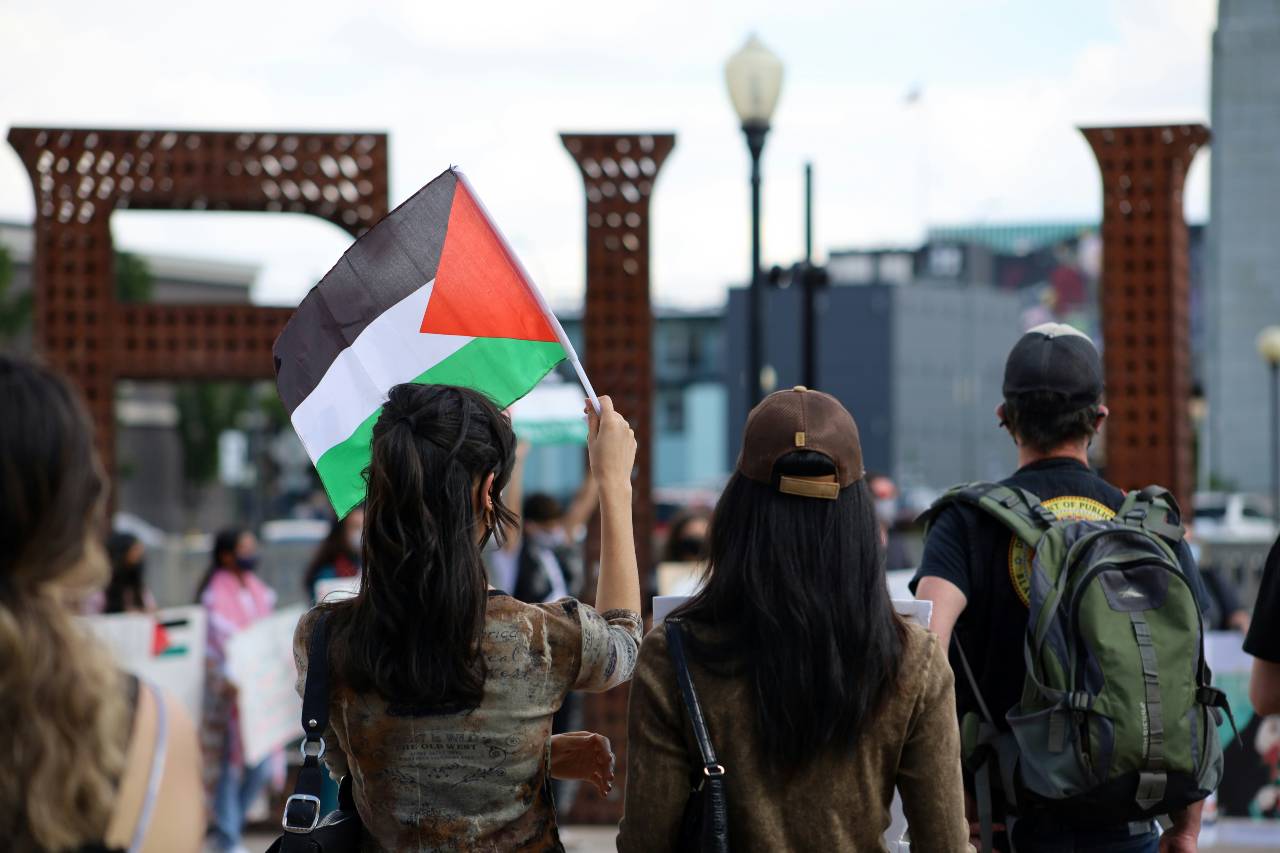 a photo of young people marching in protest