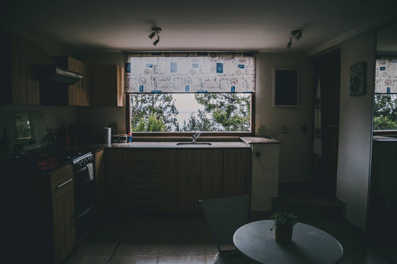 a photo of a darkened kitchen