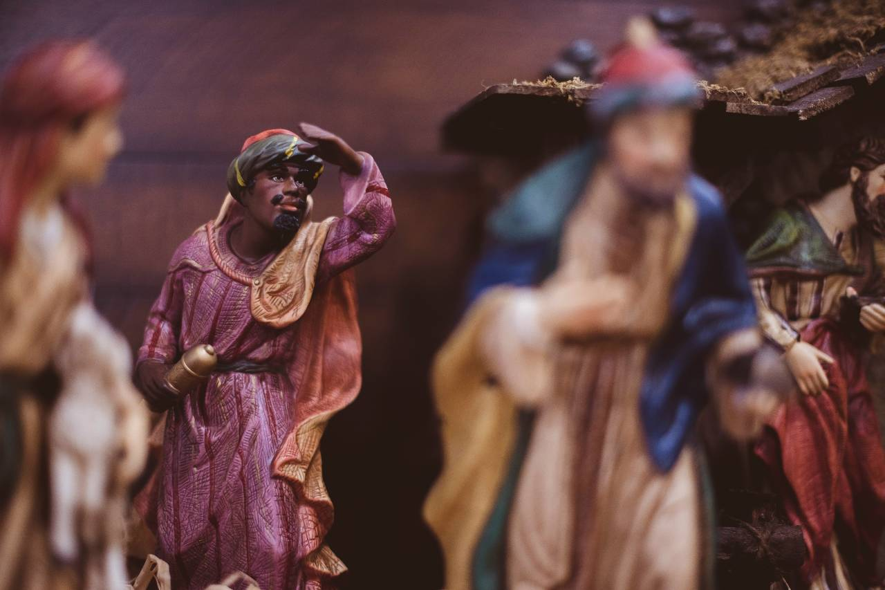 a closeup of a wise man from a nativity scene