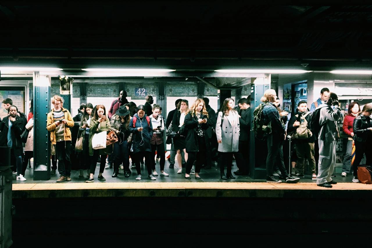 people on a subway platform