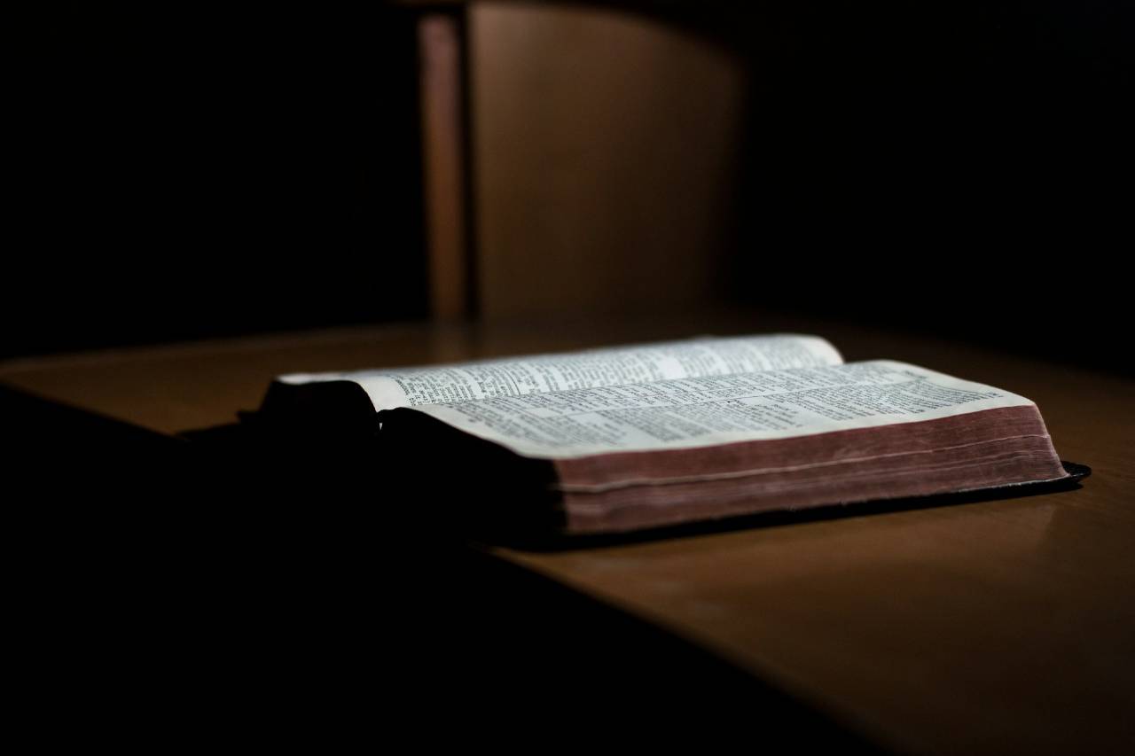 Bible open on a desk